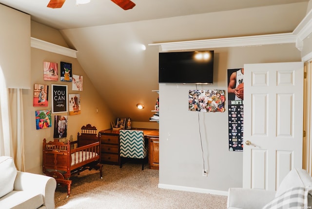 bedroom with a ceiling fan, lofted ceiling, and light colored carpet