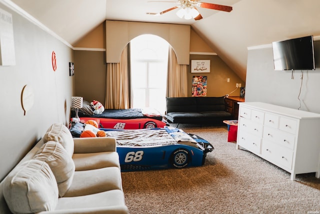 bedroom with visible vents, a ceiling fan, ornamental molding, carpet flooring, and vaulted ceiling