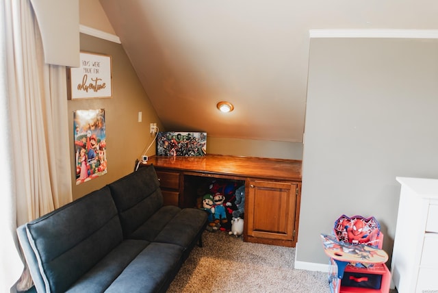 interior space with carpet and vaulted ceiling