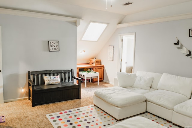 carpeted living room with vaulted ceiling with skylight, visible vents, and baseboards