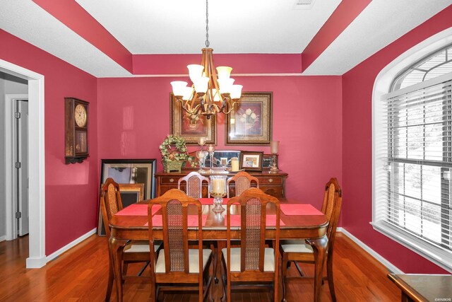113 Deerview Cir, Hot Springs, AR 71913 - dining room with a chandelier, wood finished floors, baseboards, and a raised ceiling