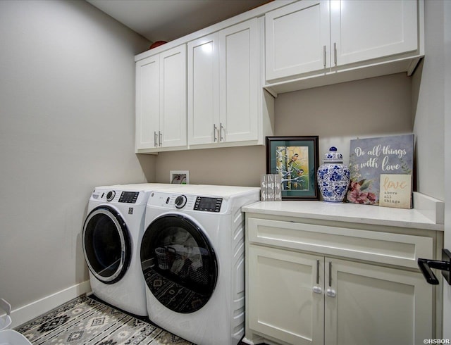 126 Luek Ln, Hot Springs, AR 71913 - washroom featuring cabinet space, baseboards, and washing machine and clothes dryer
