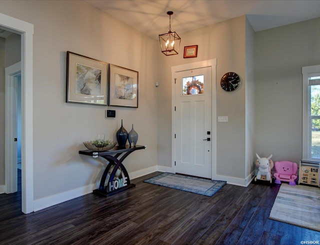126 Luek Ln, Hot Springs, AR 71913 - entrance foyer with a chandelier, dark wood finished floors, and baseboards