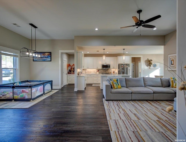 126 Luek Ln, Hot Springs, AR 71913 - living room with baseboards, visible vents, wood finished floors, and recessed lighting