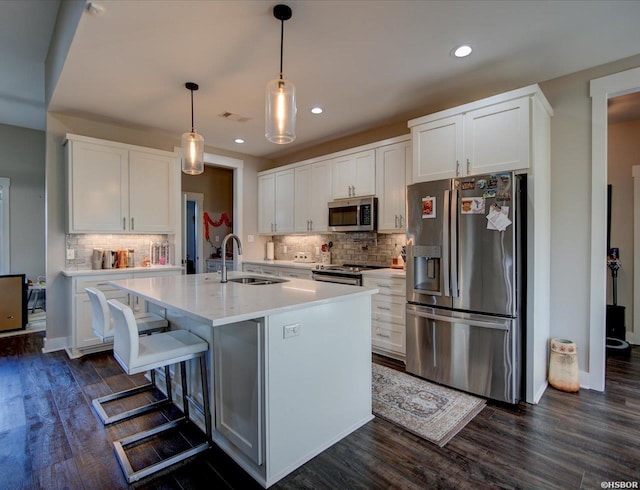 126 Luek Ln, Hot Springs, AR 71913 - kitchen featuring stainless steel appliances, light countertops, white cabinetry, and a sink