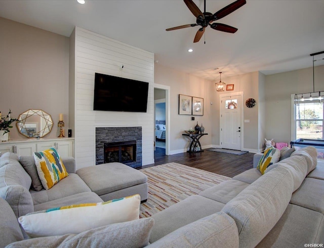 126 Luek Ln, Hot Springs, AR 71913 - living area featuring baseboards, ceiling fan, dark wood-type flooring, a stone fireplace, and recessed lighting