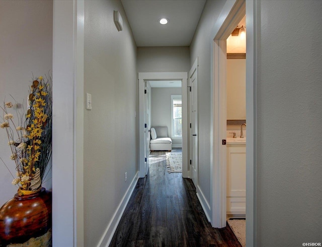 126 Luek Ln, Hot Springs, AR 71913 - corridor featuring dark wood-style floors and baseboards