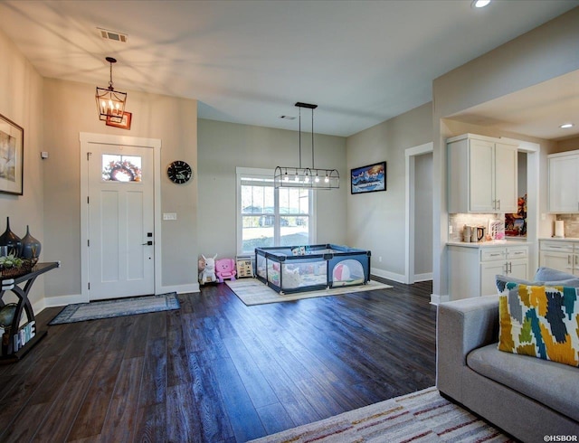 126 Luek Ln, Hot Springs, AR 71913 - entrance foyer featuring baseboards, visible vents, dark wood-type flooring, a chandelier, and recessed lighting