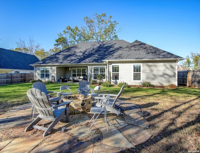 126 Luek Ln, Hot Springs, AR 71913 - back of house with a yard, a shingled roof, a patio area, fence, and a fire pit