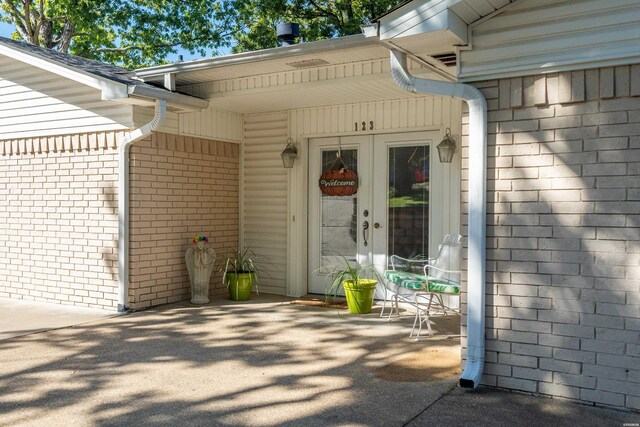 doorway to property with french doors and a patio area