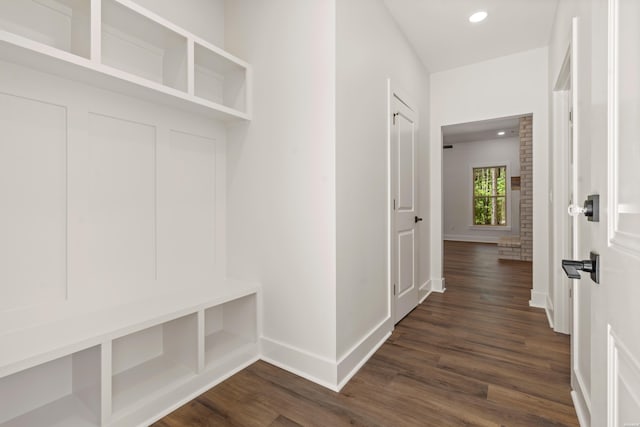 mudroom with baseboards, dark wood-style flooring, and recessed lighting