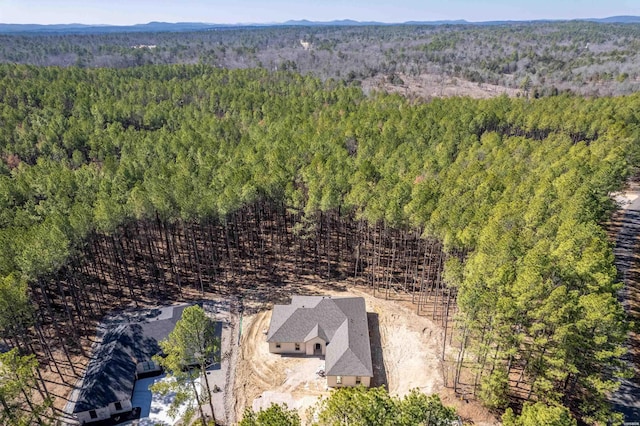 bird's eye view featuring a forest view