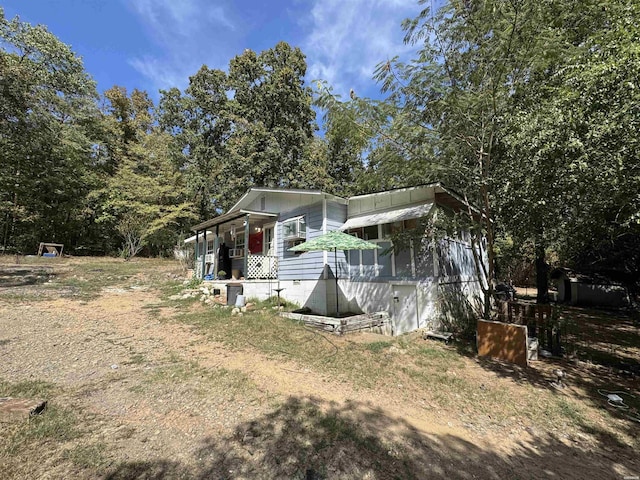 view of front of property featuring covered porch