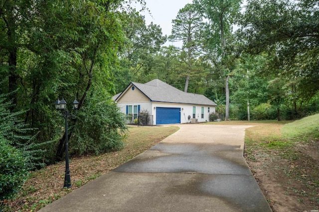 view of property exterior with a yard, a shingled roof, and stucco siding