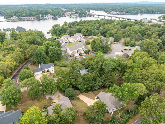 drone / aerial view with a water view and a residential view