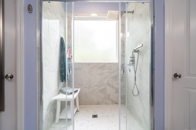 bathroom featuring a shower stall