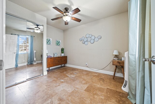 spare room featuring baseboards