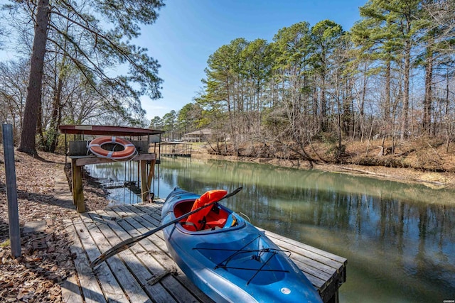 dock area featuring a water view and boat lift