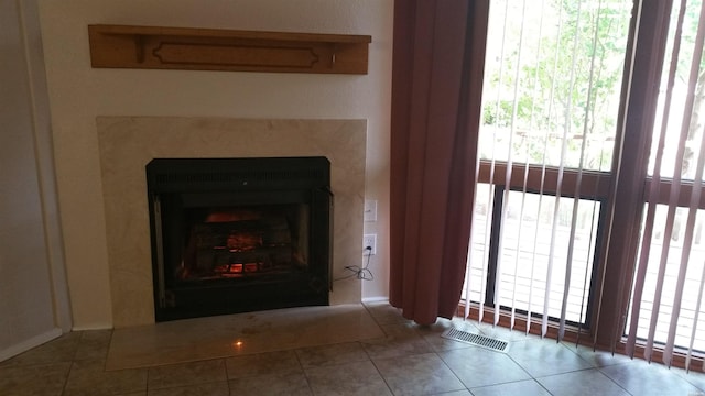 interior details with a fireplace and visible vents