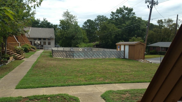 120 Cash St Unit C8, Hot Springs, AR 71913 - view of yard with fence, an outbuilding, and a storage shed