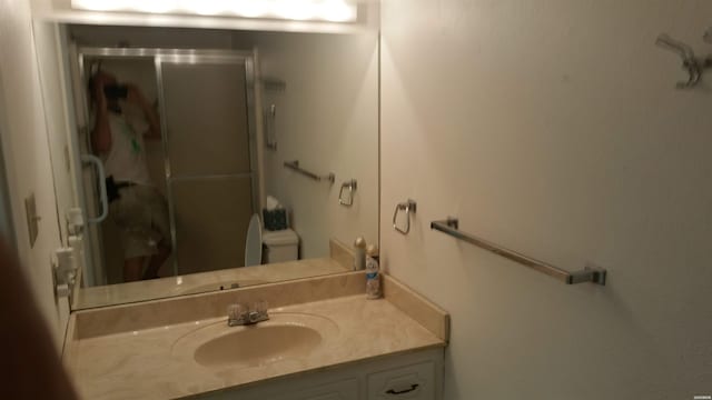 120 Cash St Unit C8, Hot Springs, AR 71913 - bathroom featuring toilet, a stall shower, and vanity