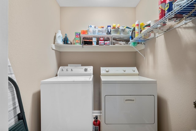 laundry room featuring laundry area and separate washer and dryer