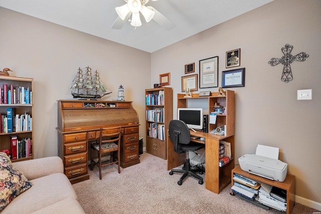 office with ceiling fan, baseboards, and light colored carpet