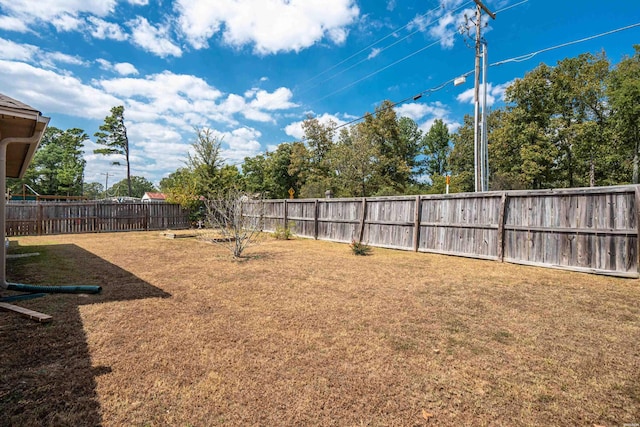 view of yard featuring a fenced backyard