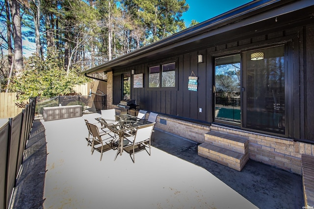 view of patio / terrace featuring fence and outdoor dining space