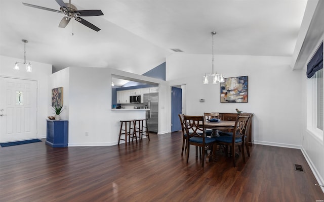 129 Mesero Way, Hot Springs Village, AR 71909 - dining space featuring vaulted ceiling, a chandelier, a ceiling fan, dark wood-style floors, and baseboards