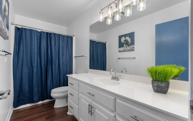 129 Mesero Way, Hot Springs Village, AR 71909 - bathroom with vanity, toilet, wood finished floors, and a shower with curtain