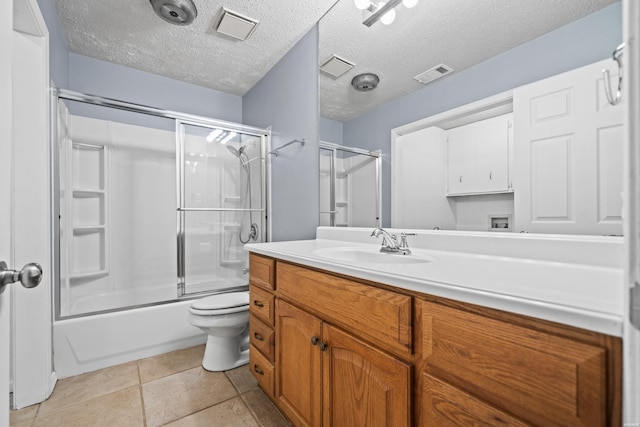 full bath featuring vanity, toilet, enclosed tub / shower combo, and a textured ceiling