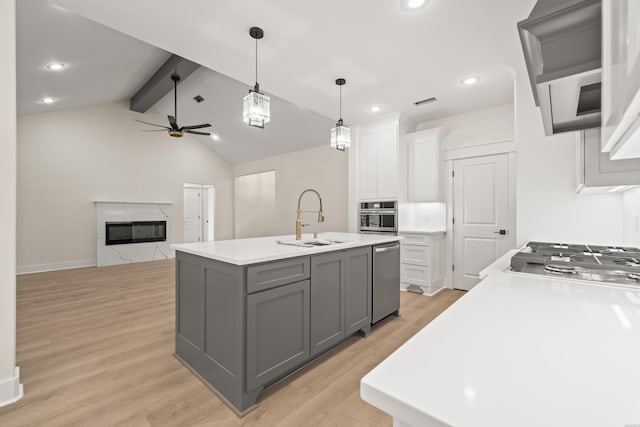 135 Ridgeway Pl, Hot Springs, AR 71901 - kitchen with a sink, appliances with stainless steel finishes, gray cabinetry, white cabinetry, and exhaust hood