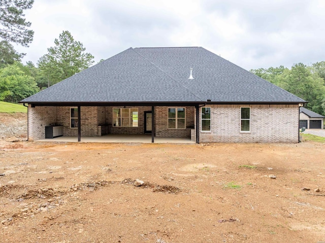 135 Ridgeway Pl, Hot Springs, AR 71901 - back of property featuring a patio, a shingled roof, and brick siding