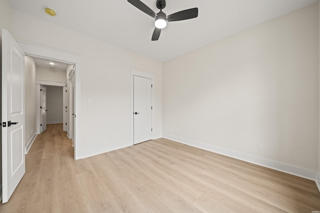 135 Ridgeway Pl, Hot Springs, AR 71901 - unfurnished bedroom with light wood finished floors, baseboards, and a ceiling fan