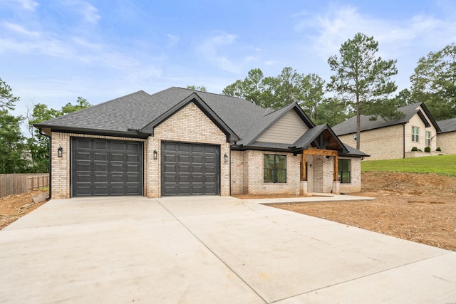 135 Ridgeway Pl, Hot Springs, AR 71901 - view of front of property featuring brick siding, an attached garage, driveway, and roof with shingles