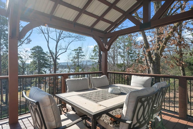deck featuring outdoor dining area