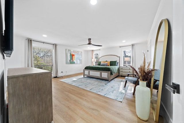 bedroom featuring baseboards, light wood-style flooring, and recessed lighting