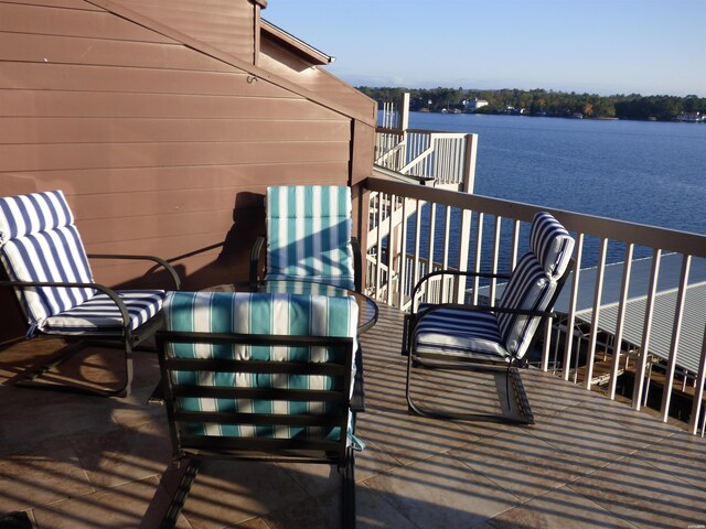 deck featuring a water view