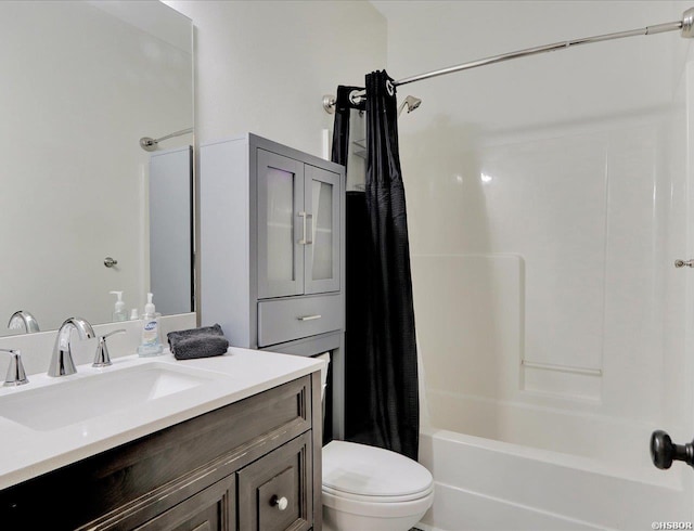 full bathroom with toilet, shower / bath combo with shower curtain, and vanity