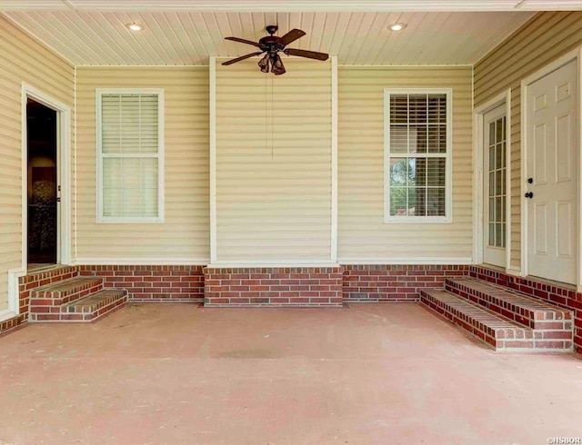 view of patio / terrace featuring entry steps and ceiling fan