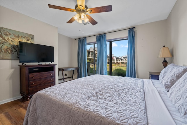 bedroom with visible vents, access to exterior, a ceiling fan, baseboards, and dark wood finished floors