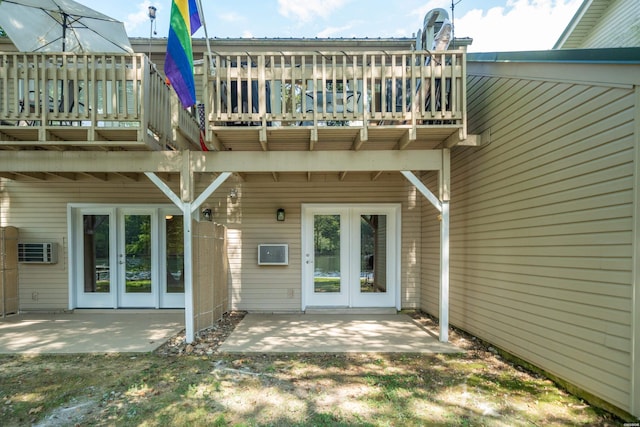 183 River Mill Ct Unit B-1, Hot Springs, AR 71913 - rear view of property featuring french doors, a patio area, an AC wall unit, and a wooden deck