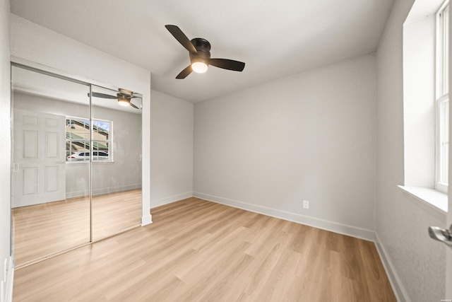 183 River Mill Ct Unit B-1, Hot Springs, AR 71913 - unfurnished bedroom with wood finished floors, a closet, and a ceiling fan