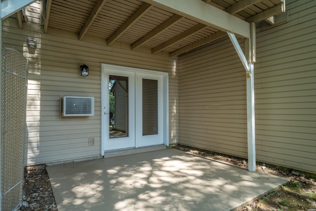 183 River Mill Ct Unit B-1, Hot Springs, AR 71913 - view of patio featuring a wall mounted AC and french doors