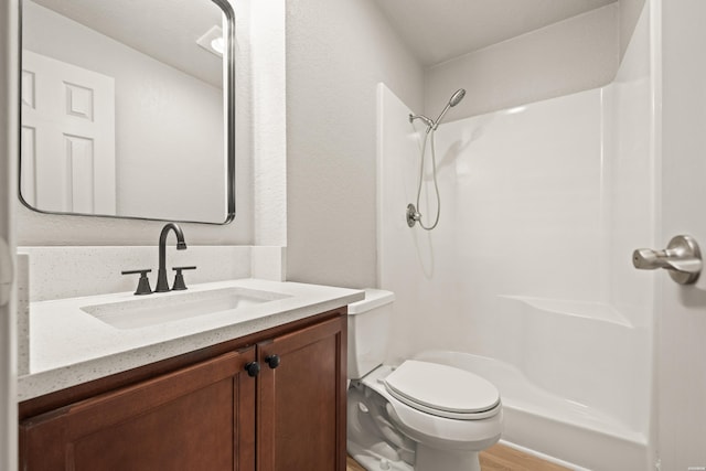 183 River Mill Ct Unit B-1, Hot Springs, AR 71913 - bathroom with vanity, a shower, and wood finished floors