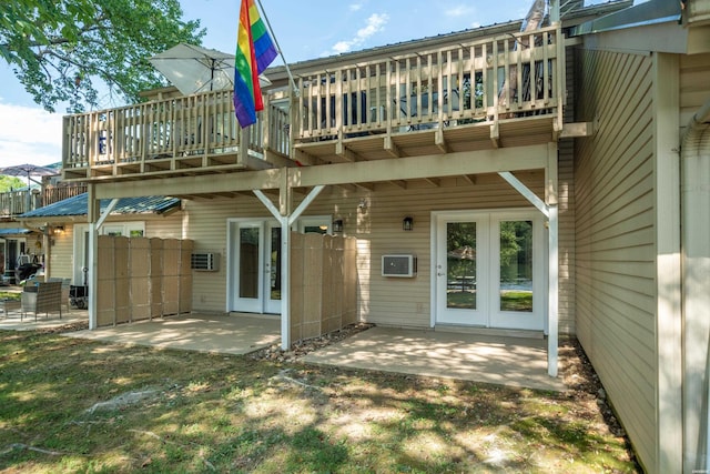 183 River Mill Ct Unit B-1, Hot Springs, AR 71913 - rear view of property with french doors, a patio area, a wall unit AC, and a deck