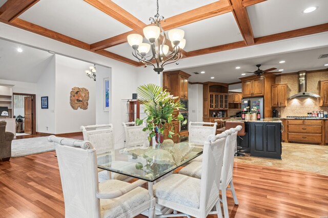 dining room featuring visible vents, light wood-style flooring, beam ceiling, and recessed lighting