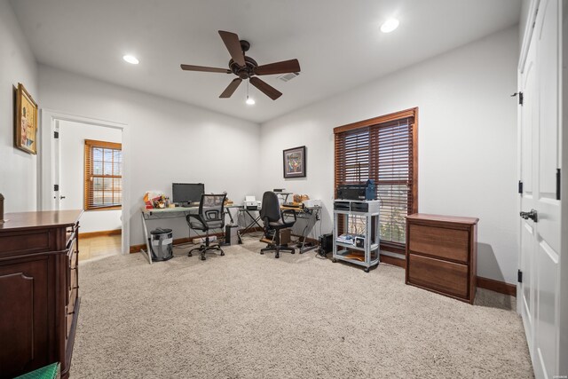 home office featuring light carpet, ceiling fan, baseboards, and recessed lighting