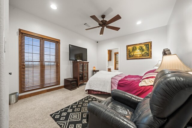 carpeted bedroom with ceiling fan, baseboards, visible vents, and recessed lighting